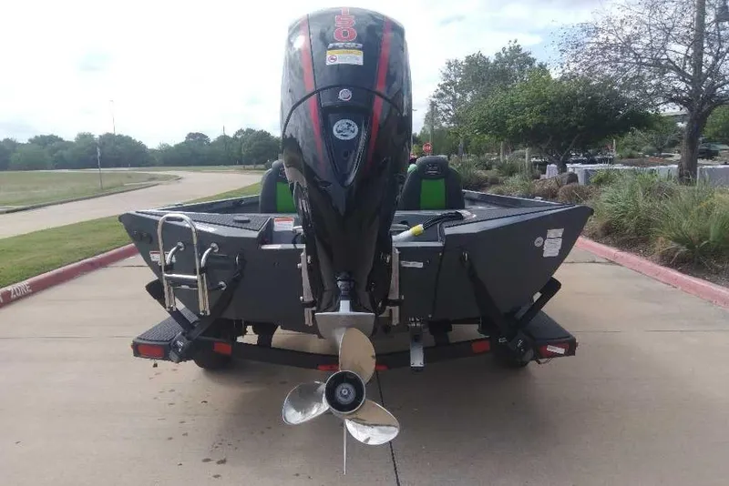 Slide: The Image of 2026 Ranger RT198P boat rear view with powerful outboard motor on trailer. - 87