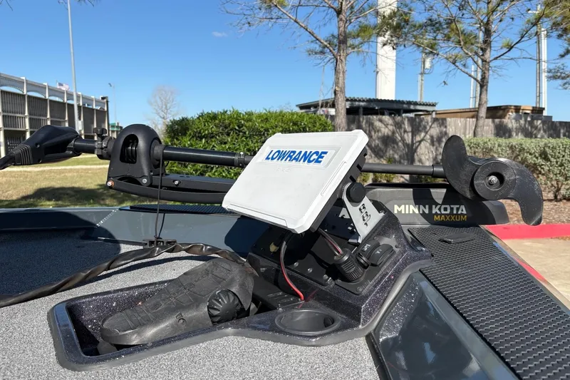 Slide: The Image of 2026 Ranger RT198P boat with Lowrance and Minn Kota Maxxum equipment, outdoors. - 15