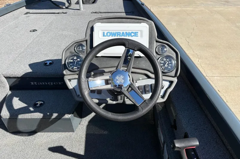 Slide: The Image of Steering console of 2026 Ranger RT198P boat with Lowrance display and gauges. - 14