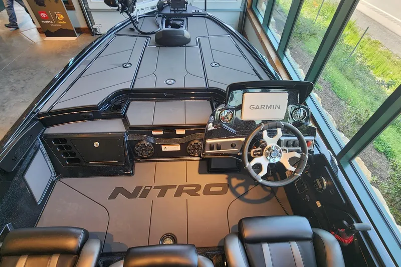 Slide: The Image of 2026 Nitro Z19 XL Pro boat interior with Garmin navigation system and sleek design. - 3