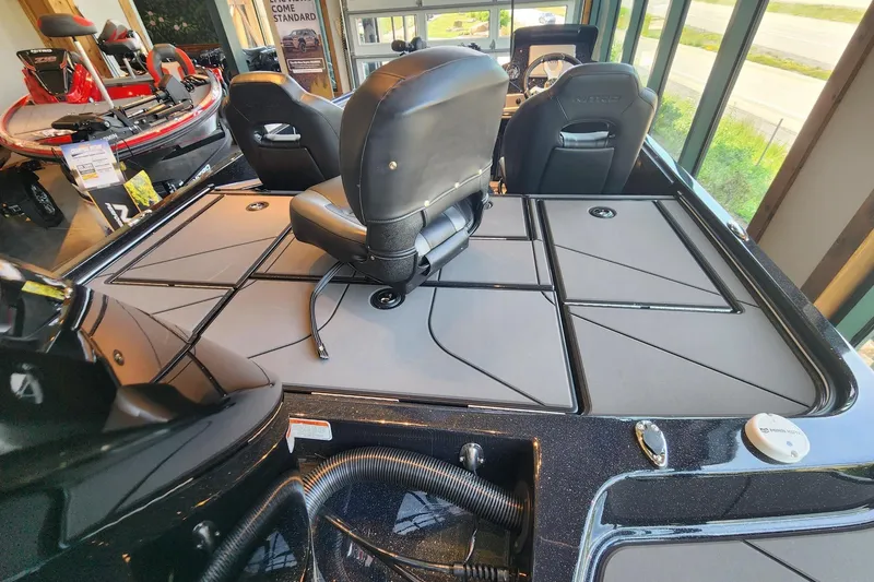 Slide: The Image of 2026 Nitro Z19 XL Pro boat interior with sleek seating and storage compartments. - 5