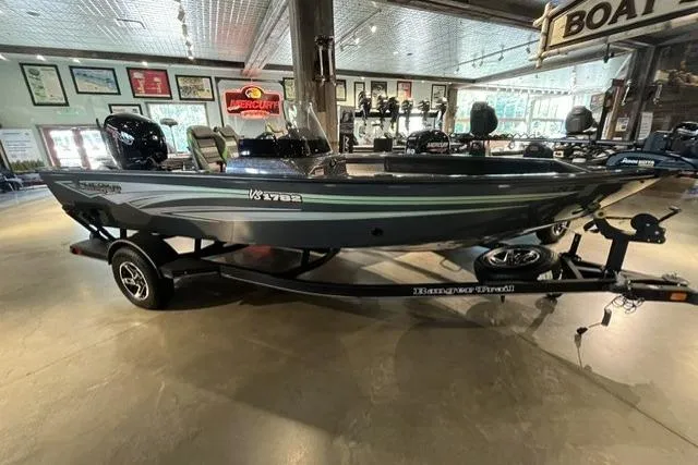 The Image of 2026 Ranger VS1782SC Angler boat displayed indoors on a trailer. - 0