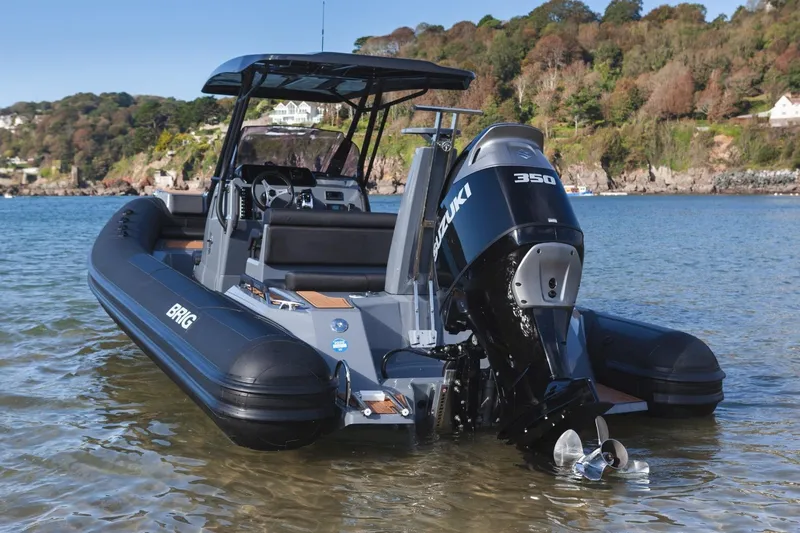 Slide: The Image of 2026 Brig Eagle 8 boat with Suzuki 350 engine in scenic coastal waters. - 6