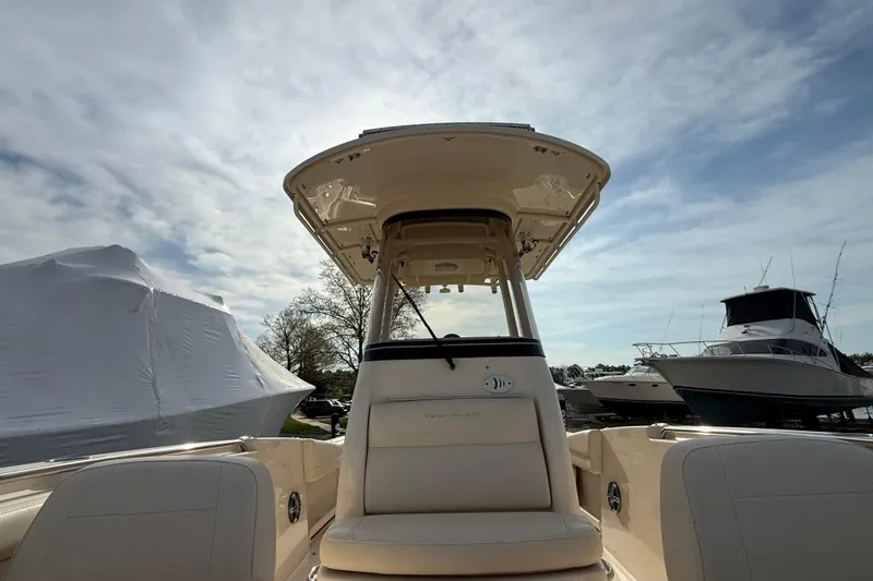 Slide: The Image of 2021 Grady-White Fisherman 236 boat at marina under cloudy sky. - 10