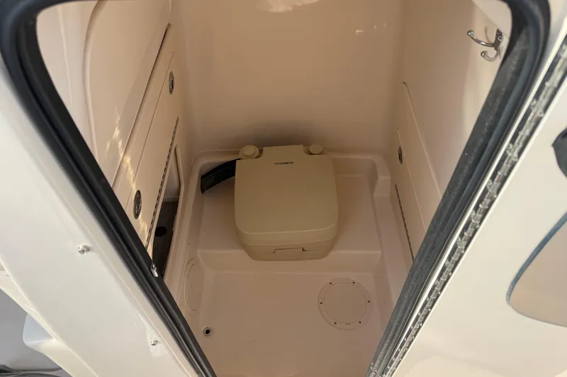 Slide: The Image of Interior of 2021 Grady-White Fisherman 236 boat with portable toilet. - 24