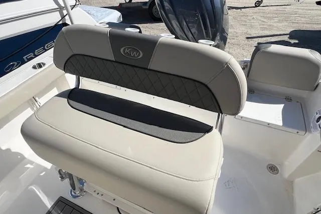 Slide: The Image of 2026 Key West 189 FS boat seat with beige upholstery and KW logo. - 3