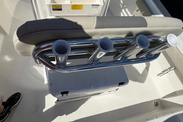 Slide: The Image of 2026 Key West 189 FS boat interior with rod holders and cooler. - 4