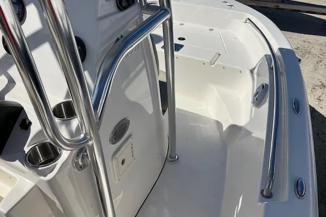 Slide: The Image of 2026 Key West 189 FS boat interior with stainless steel railings and cup holders. - 8