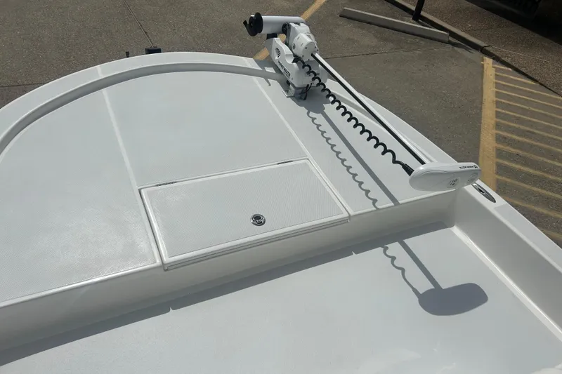 Slide: The Image of 2023 Shallow Sport 18 Sport boat deck with trolling motor, showcasing sleek design. - 8