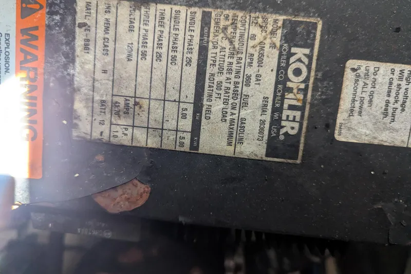 Slide: The Image of Label on Kohler generator with warning sign, Sea Ray 290 Amberjack 2005. - 20