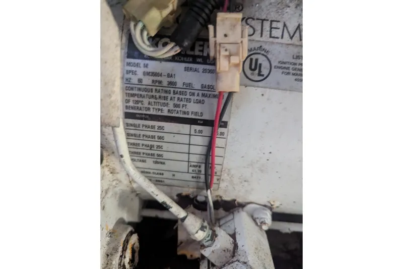 Slide: The Image of Close-up of a Kohler generator label on a 2005 Sea Ray 290 Amberjack boat. - 23