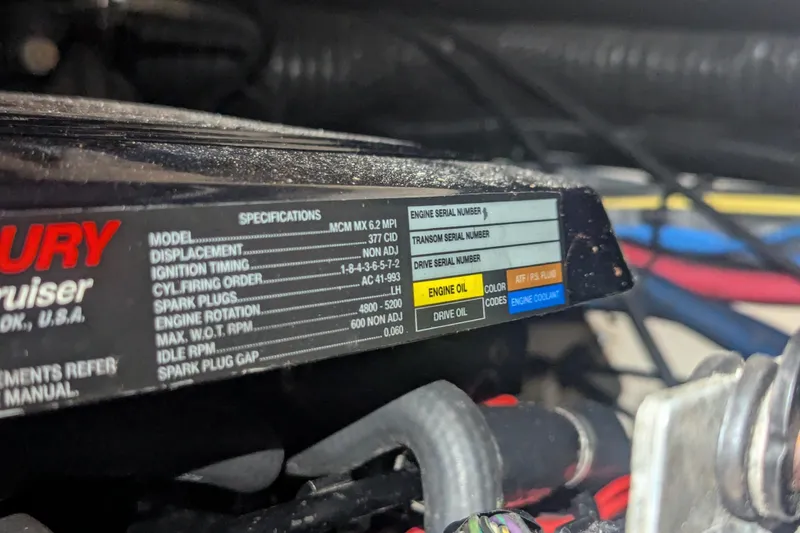 Slide: The Image of Engine specifications label on a 2005 Sea Ray 290 Amberjack boat. - 29