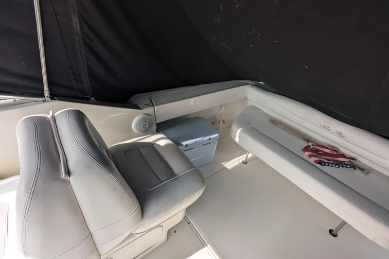 Slide: The Image of Interior of 2005 Sea Ray 290 Amberjack boat with seating and American flag. - 35