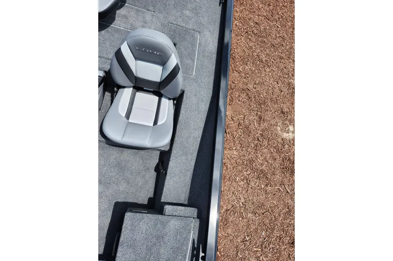 Slide: The Image of 2026 Lowe Stinger 175C boat interior with gray seating and carpeted flooring. - 30