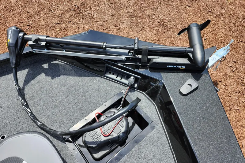 Slide: The Image of 2026 Lowe Stinger 175C boat with Minn Kota trolling motor on deck. - 36