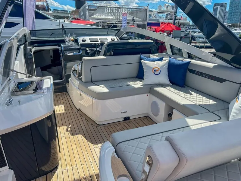 Slide: The Image of 2023 Fairline F//Line 33 Outboard luxury yacht interior with plush seating and modern design. - 17