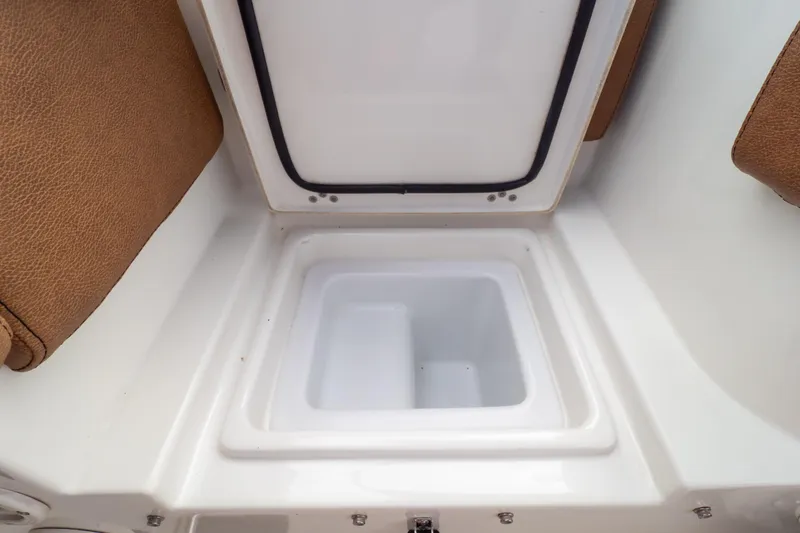 Slide: The Image of Open storage compartment on 2021 Sea Hunt Gamefish 27 Forward Seating boat. - 110