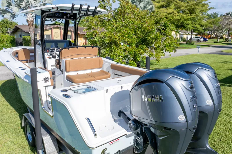 Slide: The Image of Twin Yamaha 250 V6 outboard engines on a 2021 Sea Hunt Gamefish 27 boat. - 18