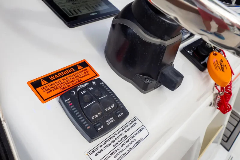 Slide: The Image of Close-up of a polished metal cleat on a 2021 Sea Hunt Gamefish 27 boat. - 31