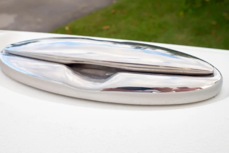 Slide: The Image of Close-up of a polished cleat on a 2021 Sea Hunt Gamefish 27 boat. - 32