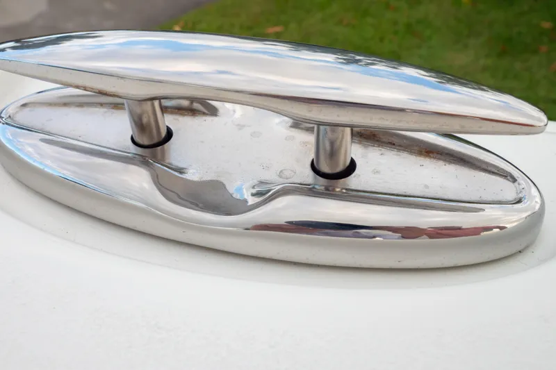 Slide: The Image of Close-up of a polished metal fitting on a 2021 Sea Hunt Gamefish 27 boat. - 33