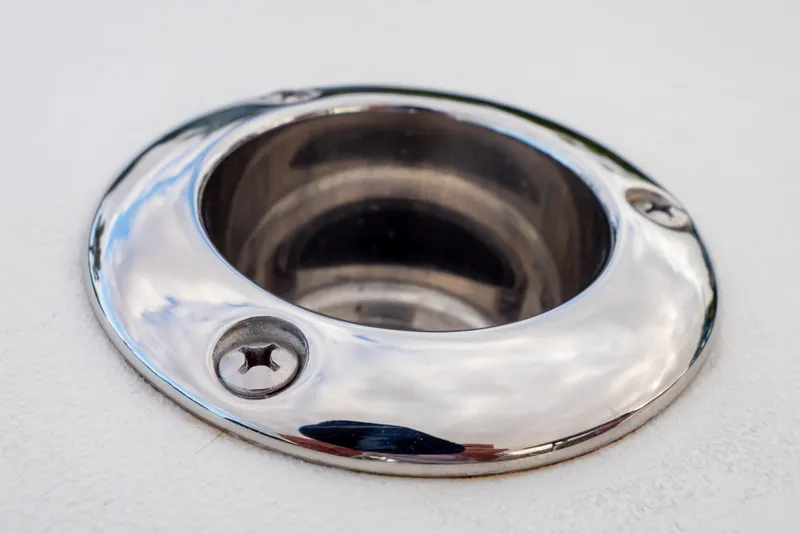 Slide: The Image of Close-up of a stainless steel cup holder on a 2021 Sea Hunt Gamefish 27 boat. - 34
