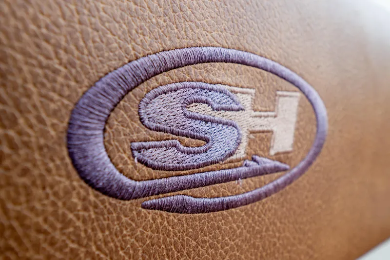 Slide: The Image of 2021 Sea Hunt Gamefish 27 Forward Seating with tan cushions, showcasing spacious and comfortable design. - 36