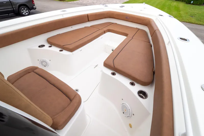 Slide: The Image of 2021 Sea Hunt Gamefish 27 Forward Seating with brown cushioned seat and backrest. - 41