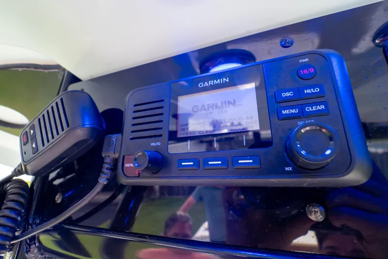 Slide: The Image of Garmin marine radio on 2021 Sea Hunt Gamefish 27 Forward Seating boat dashboard. - 50