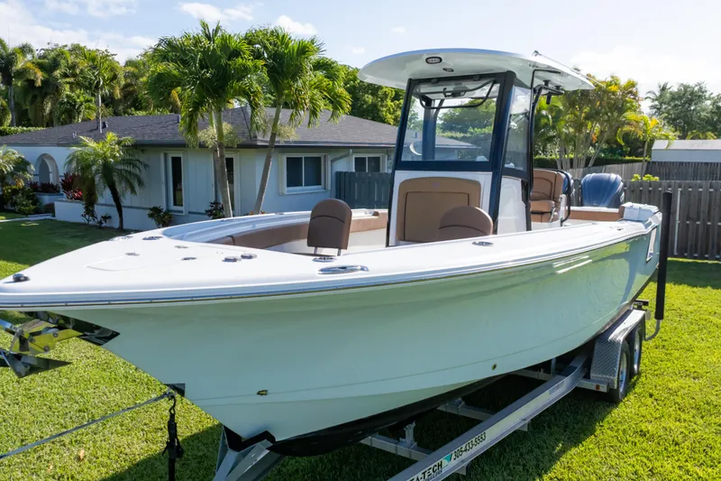 Slide: The Image of 2021 Sea Hunt Gamefish 27 boat interior with seating and speaker details. - 70