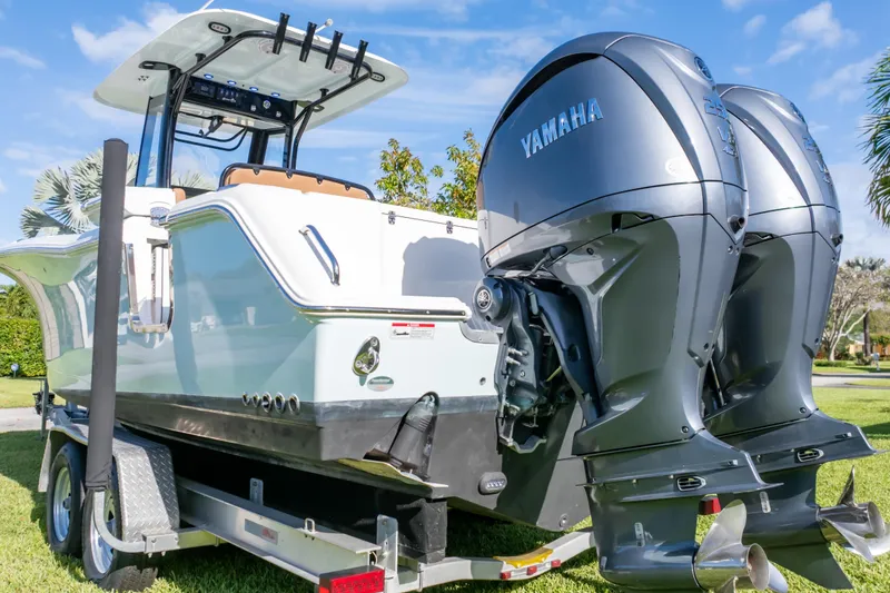 Slide: The Image of Interior cabin of 2021 Sea Hunt Gamefish 27, featuring sleek design and oval windows. - 79