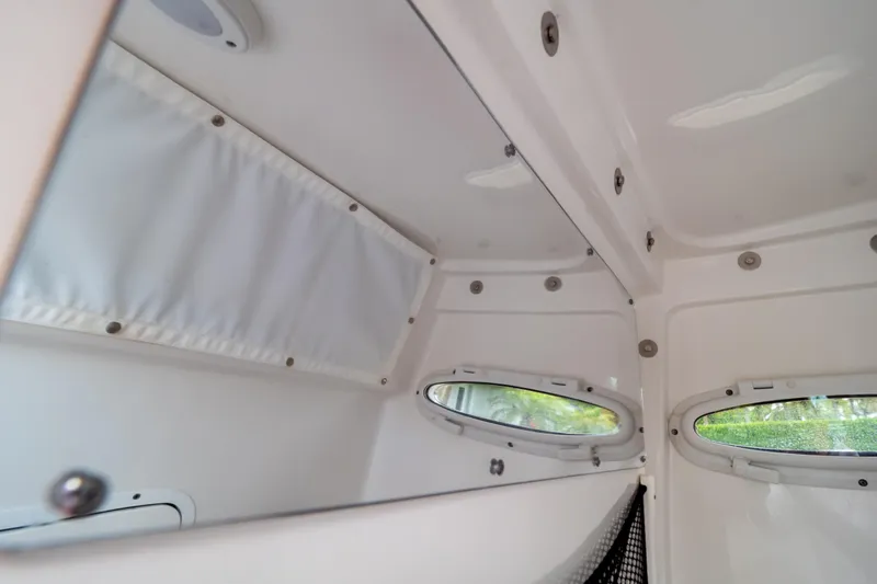 Slide: The Image of Open storage compartment on 2021 Sea Hunt Gamefish 27 Forward Seating boat. - 81