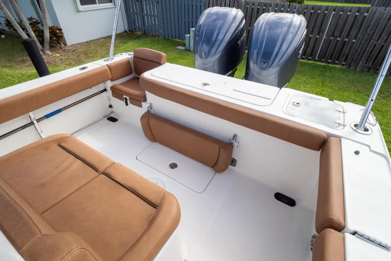 Slide: The Image of Twin Yamaha outboard engines on a 2021 Sea Hunt Gamefish 27 boat. - 99