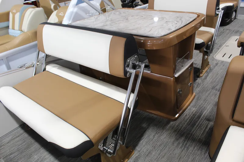 Slide: The Image of Luxurious seating and table on 2026 Avalon 2585 25 Catalina ENT boat interior. - 10