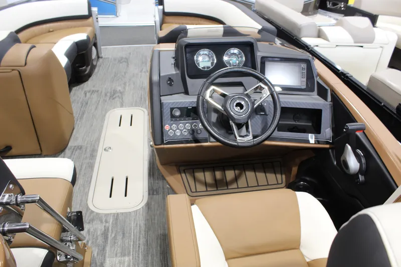 Slide: The Image of Interior view of 2026 Avalon 2585 25 Catalina ENT boat, featuring modern dashboard and seating. - 3