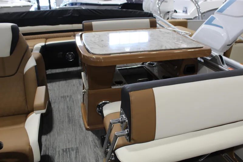 Slide: The Image of 2026 Avalon 2585 25 Catalina ENT boat interior with luxurious seating and elegant table design. - 6