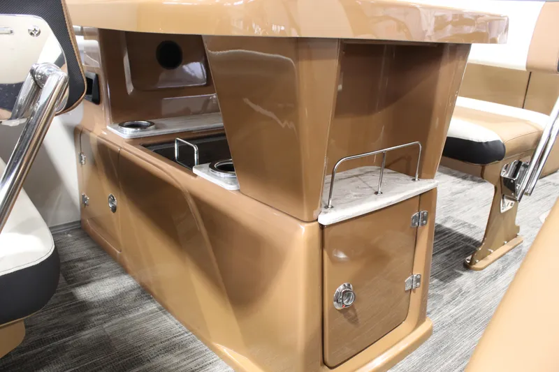 Slide: The Image of 2026 Avalon 2585 25 Catalina ENT boat interior with brown cabinetry and seating. - 7