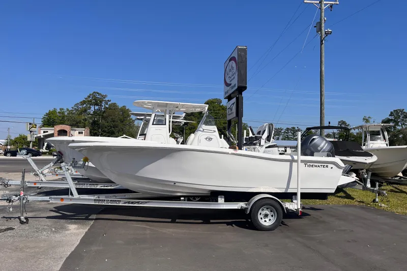 The Image of 2026 Tidewater 198 CC Adventure boat on trailer outdoors. - 0