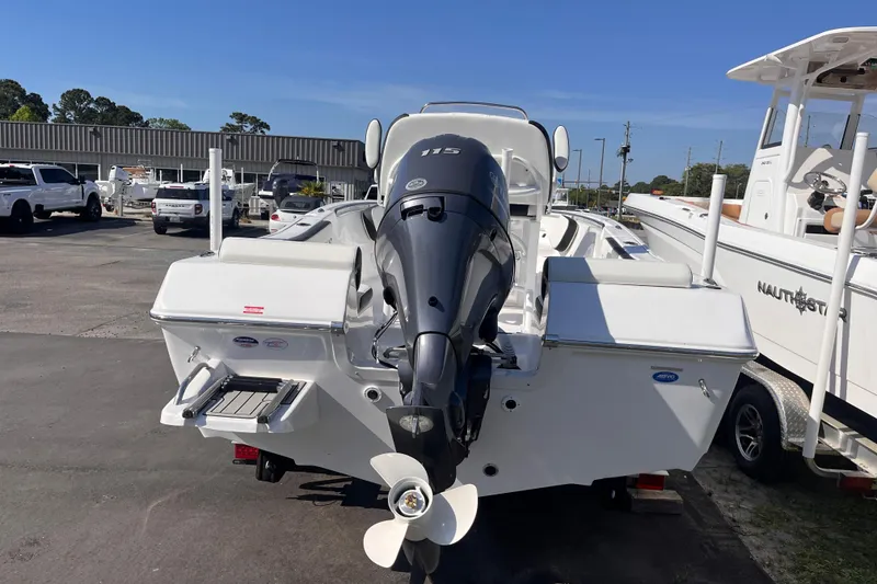 Slide: The Image of Rear view of 2026 Tidewater 198 CC Adventure boat outdoors. - 3