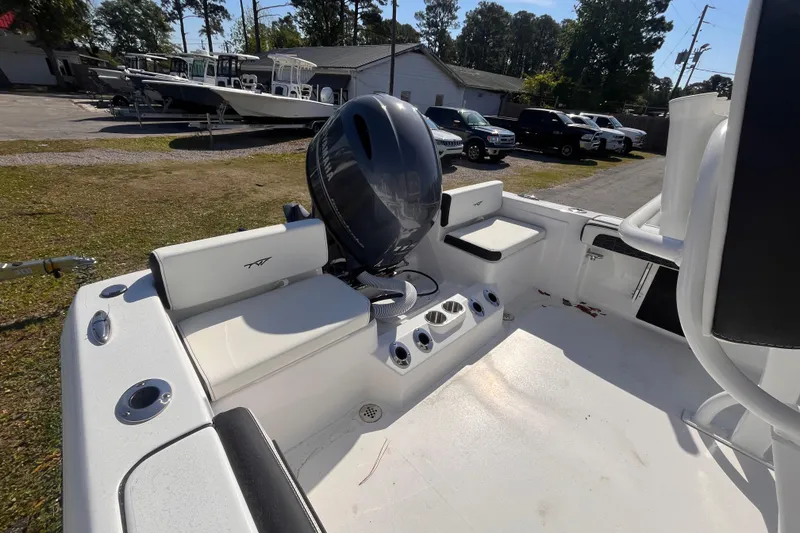 Slide: The Image of 2026 Tidewater 198 CC Adventure boat parked outdoors. - 4