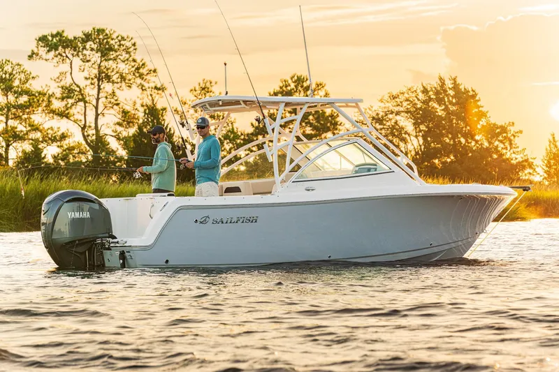 The Image of Sailfish 245 DC 2027 boat fishing at sunset. - 1