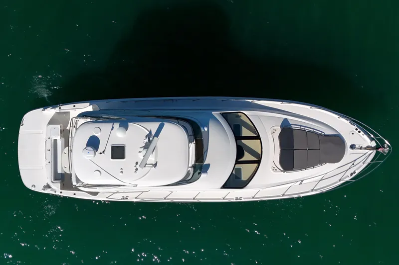 Slide: The Image of Top view of a 2007 Sea Ray 52 Sedan Bridge yacht on water. - 23