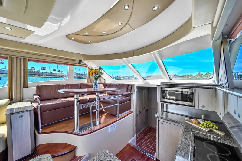 Slide: The Image of Luxurious interior of 2007 Sea Ray 52 Sedan Bridge yacht with modern amenities and scenic views. - 48