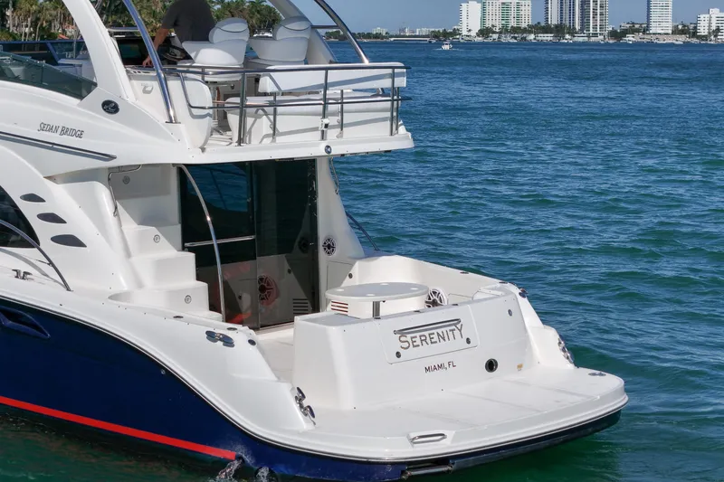 Slide: The Image of 2007 Sea Ray 52 Sedan Bridge yacht named Serenity in Miami waters. - 5