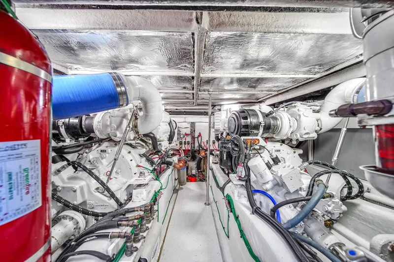 Slide: The Image of Engine room of a 2007 Sea Ray 52 Sedan Bridge yacht, showcasing machinery and equipment. - 68