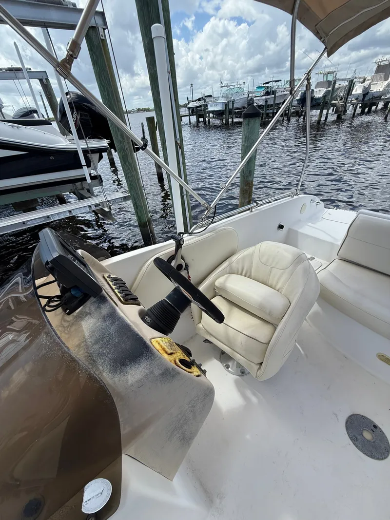 Slide: The Image of Interior view of a 2007 NauticStar 210 Sport Deck boat at dock. - 5