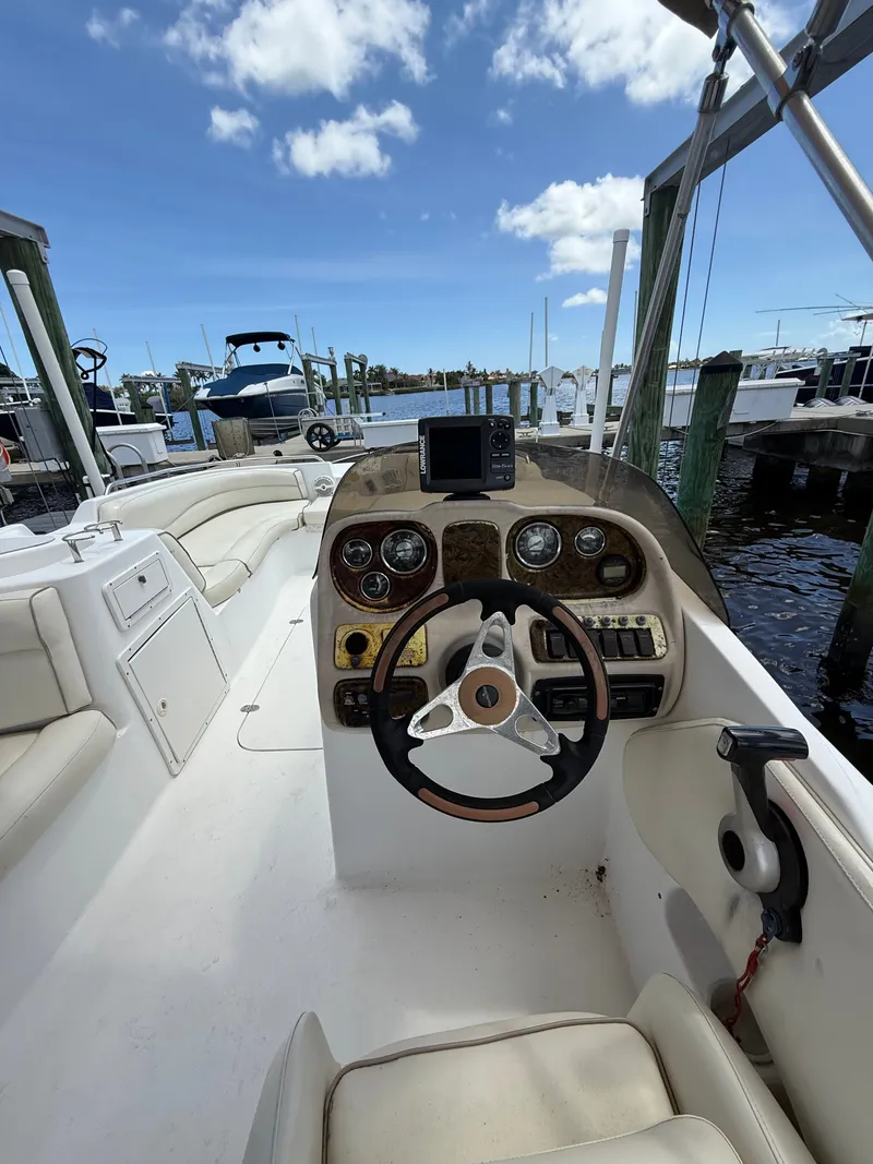 Slide: The Image of Interior view of a 2007 NauticStar 210 Sport Deck boat at the dock. - 6