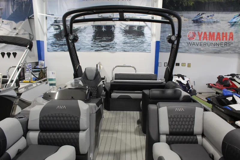 Slide: The Image of Avalon 2585 27-3 Excalibur LTD FL 2026 pontoon boat interior with luxury seating. - 2