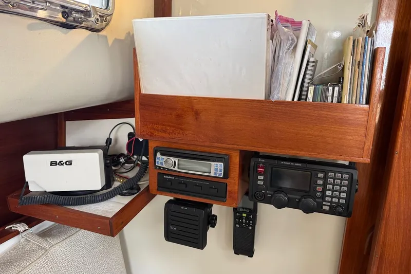 Slide: The Image of Navigation equipment and radio setup on a 1975 Soverel 37 sailboat. - 15