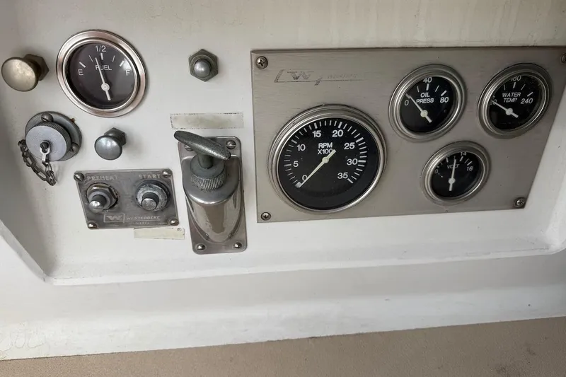 Slide: The Image of Control panel of a 1975 Soverel 37 boat with gauges and switches. - 7